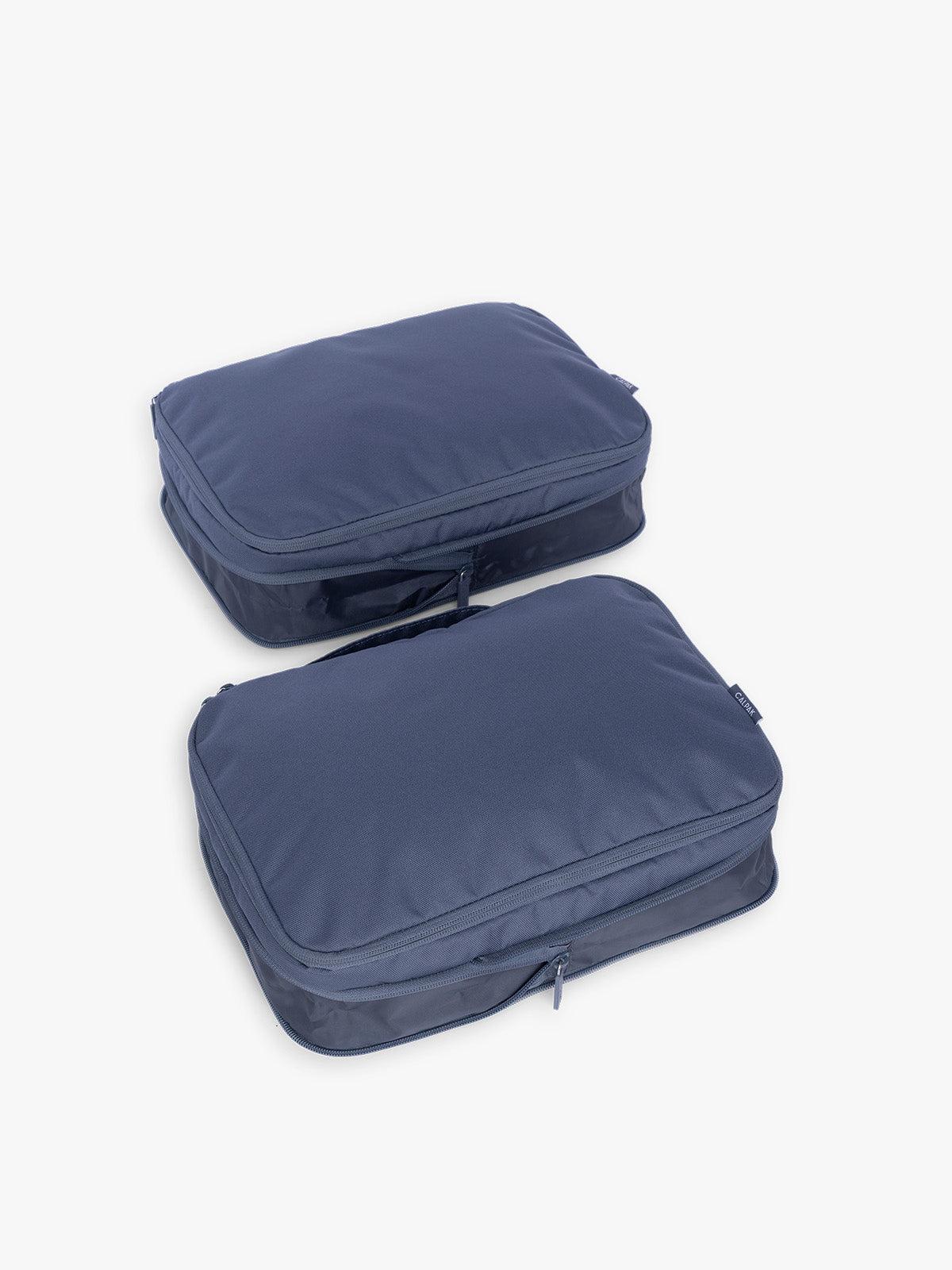 CALPAK Medium Compression Packing Cubes (Set of 2) uncompressed in dark blue Indigo; PCC2201-INDIGO