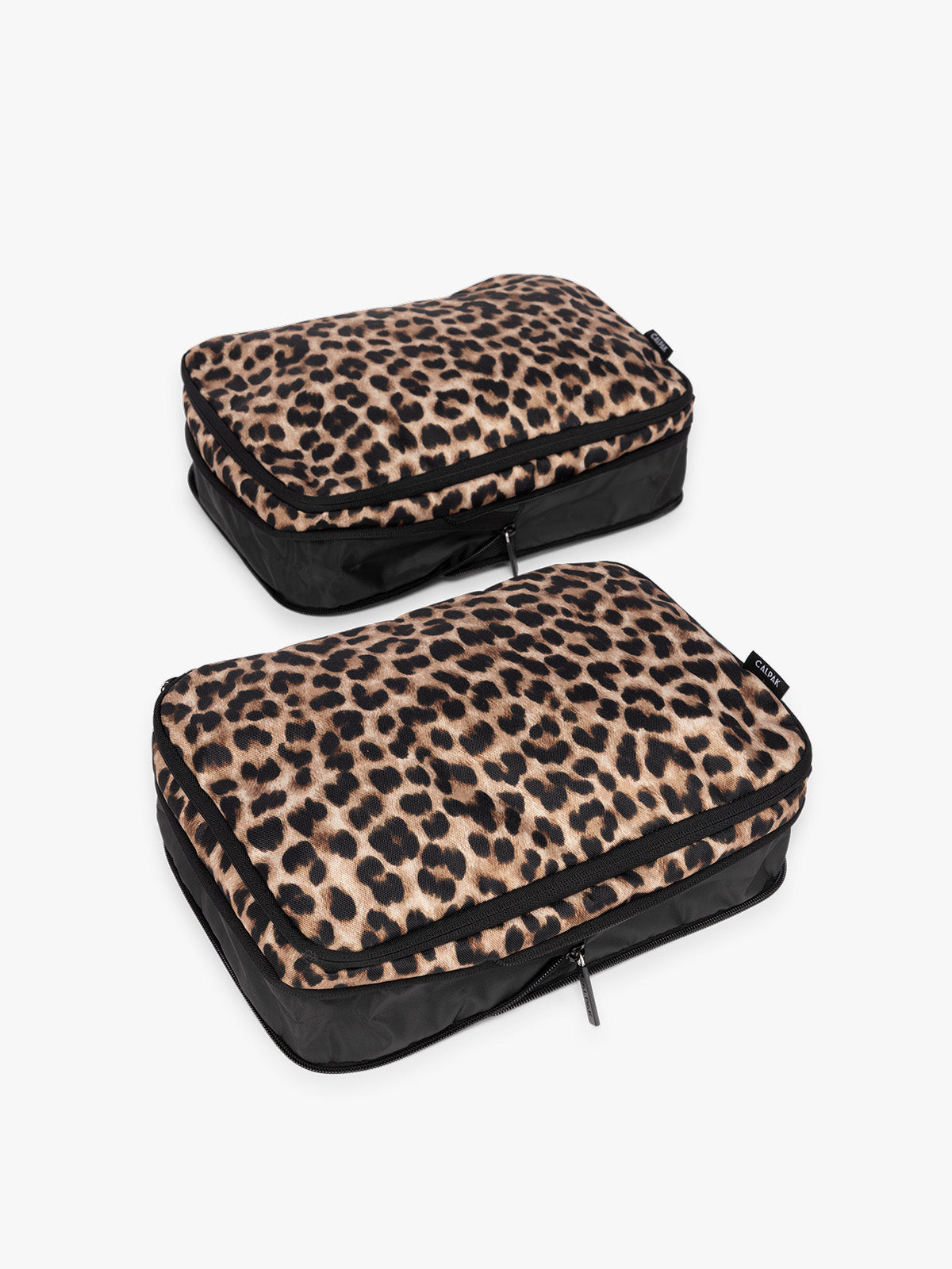 Two tan and black animal print Leopard CALPAK Medium Compression Packing Cubes with zippers shown on a clean white background uncompressed view; PCC2201-LEOPARD