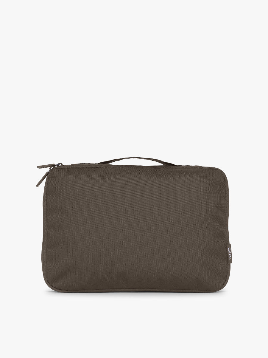 One of CALPAK Medium Compression Packing Cubes in brown Mushroom; PCC2201-MUSHROOM