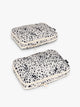 Two white and black animal print Snow Leopard CALPAK Medium Compression Packing Cubes with zippers shown on a clean white background; PCC2201-SNOW-LEOPARD