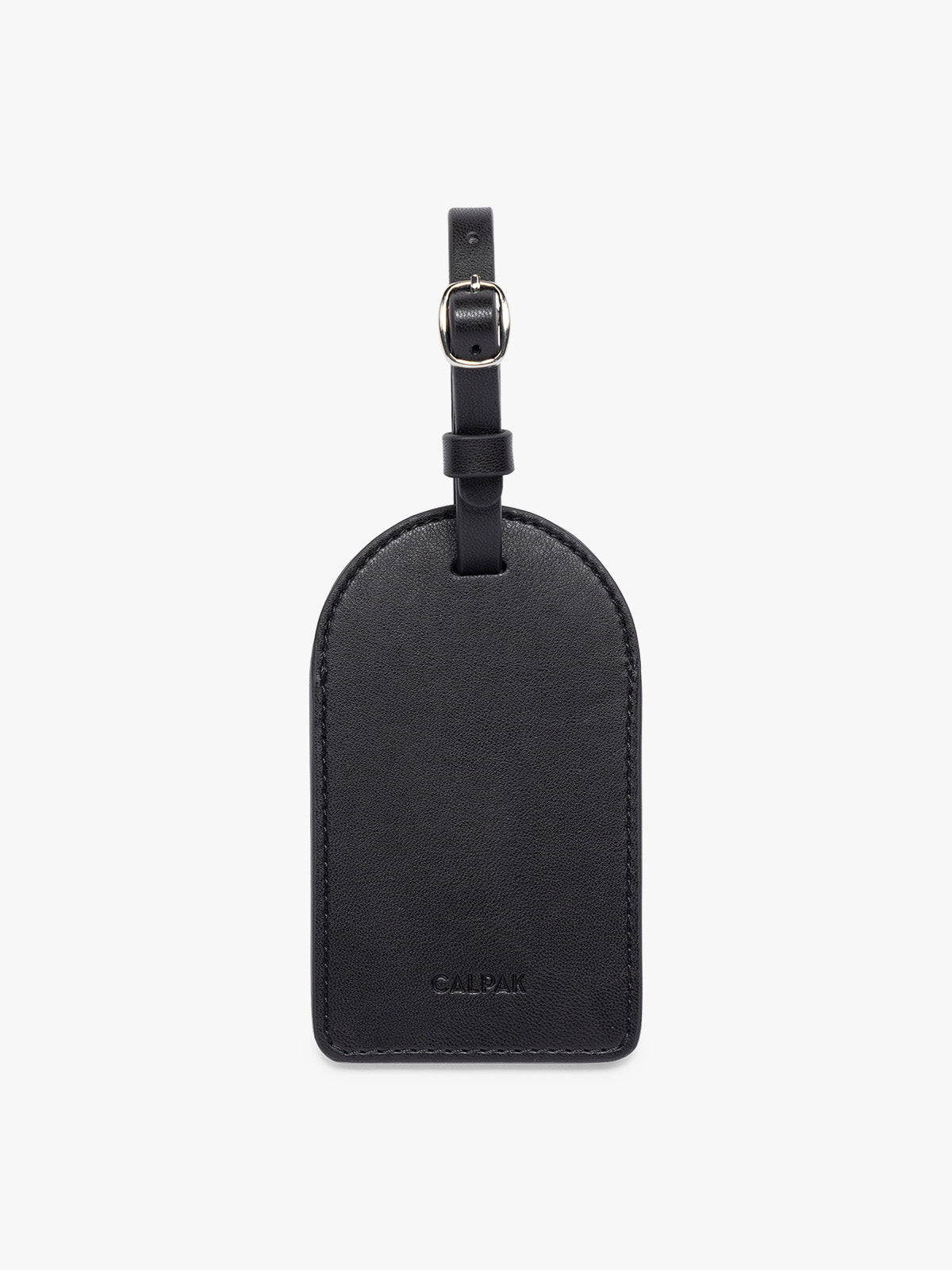 A blackCALPAK Luggage Tag with a matching strap and silver-tone metal buckle, featuring the embossed brand name 'CALPAK' at the bottom, shown on a clean white background; PWTS2601-BLACK