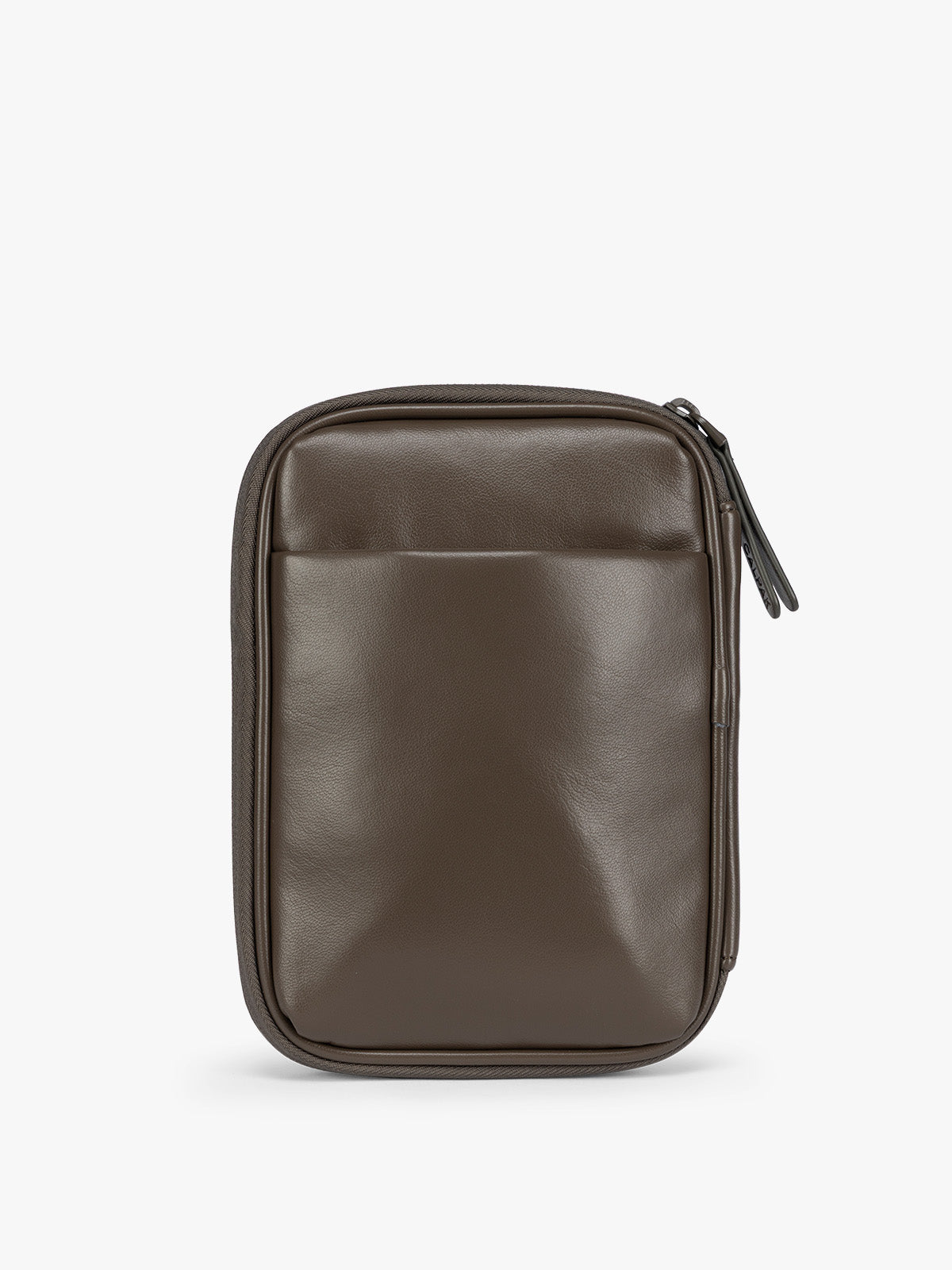 Backside of a dark brown Mushroom CALPAK Luka Zip Passport Wallet in vegan leather with a zippered top and a front pocket, shown on a plain white background; PZW2301-MUSHROOM-PU