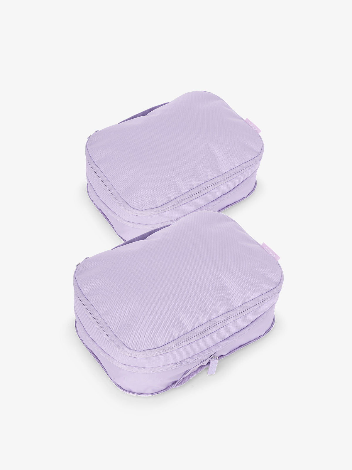CALPAK small compression packing cubes with top handles and expandable by 4.5 inches in purple orchid; PCS2301-ORCHID
