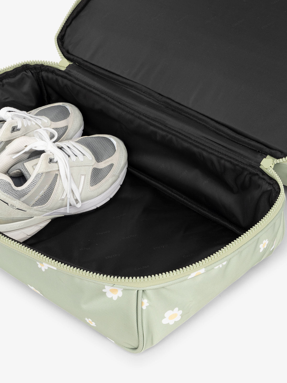 CALPAK Stevyn Duffel bag with bottom shoe compartment for travel in floral green print; DST7019-DAISY