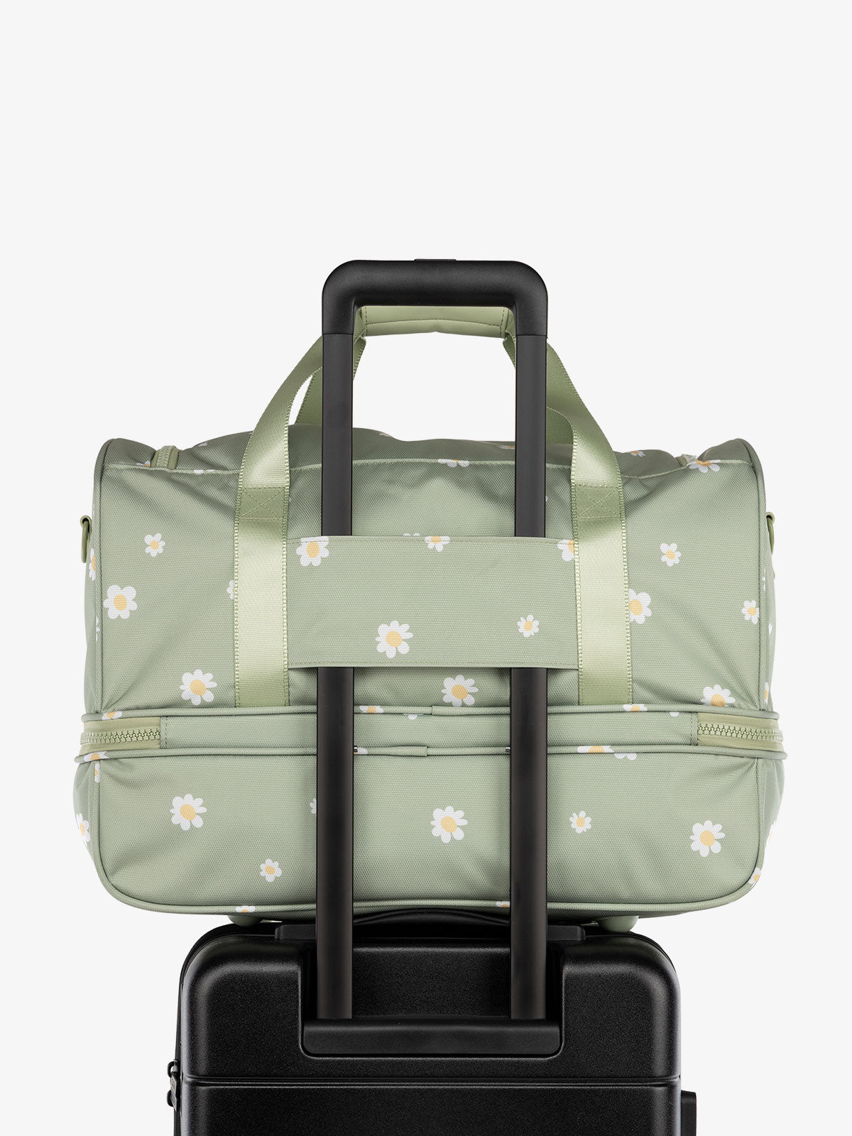 CALPAK Stevyn Duffel bag with trolley sleeve in green floral print; DST7019-DAISY