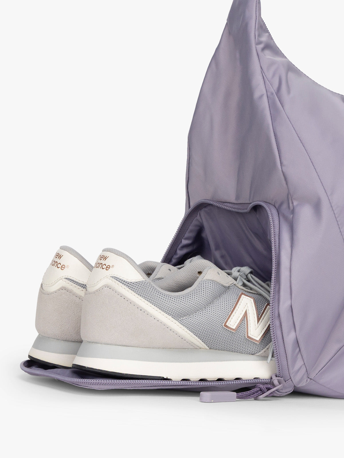 Shoe compartment for the CALPAK Fit Gym Duffel Bag in purple Iris; TBF2401-IRIS