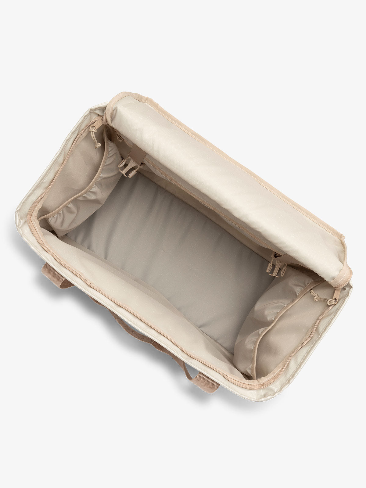CALPAK Terra 35L Water Resistant Zippered Tote Bag with water resistant lining and multiple interior pockets in beige; TTO2401-WHITE-SANDS