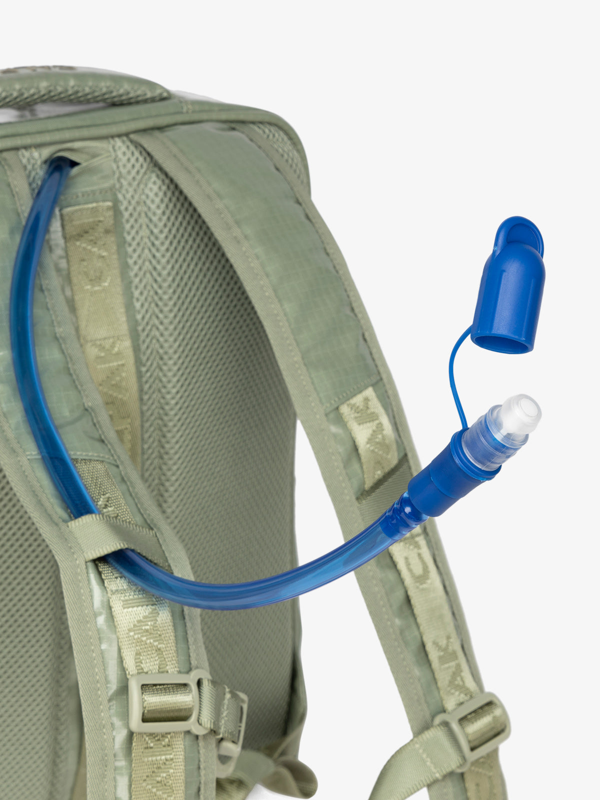 Close up of removable CALPAK hydration reservoir straw with valve cap in juniper; BPT2201-JUNIPER