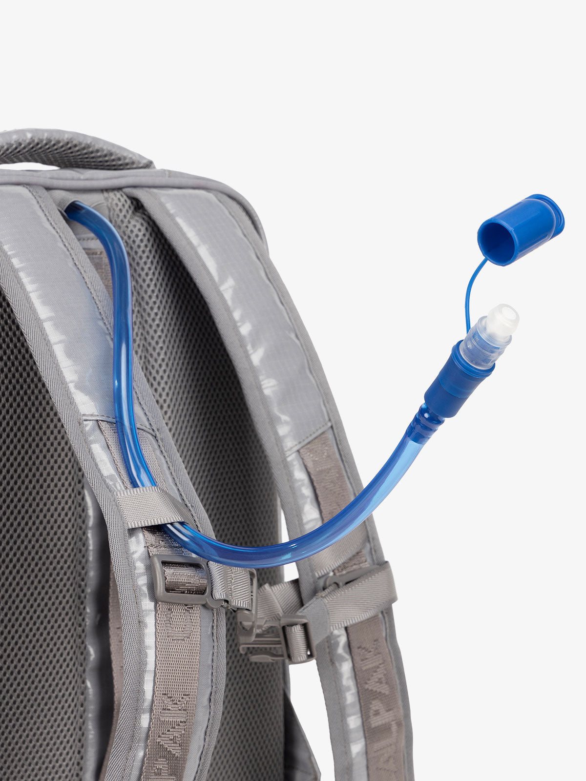 Close up of removable CALPAK hydration reservoir straw with valve cap in storm gray; BPT2201-STORM