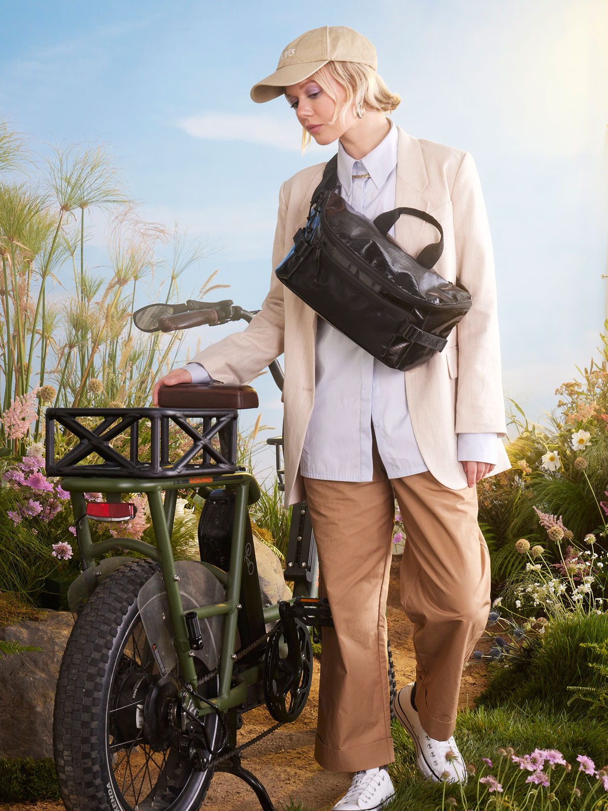 woman with CALPAK sling bag; CBH2201-OBSIDIAN