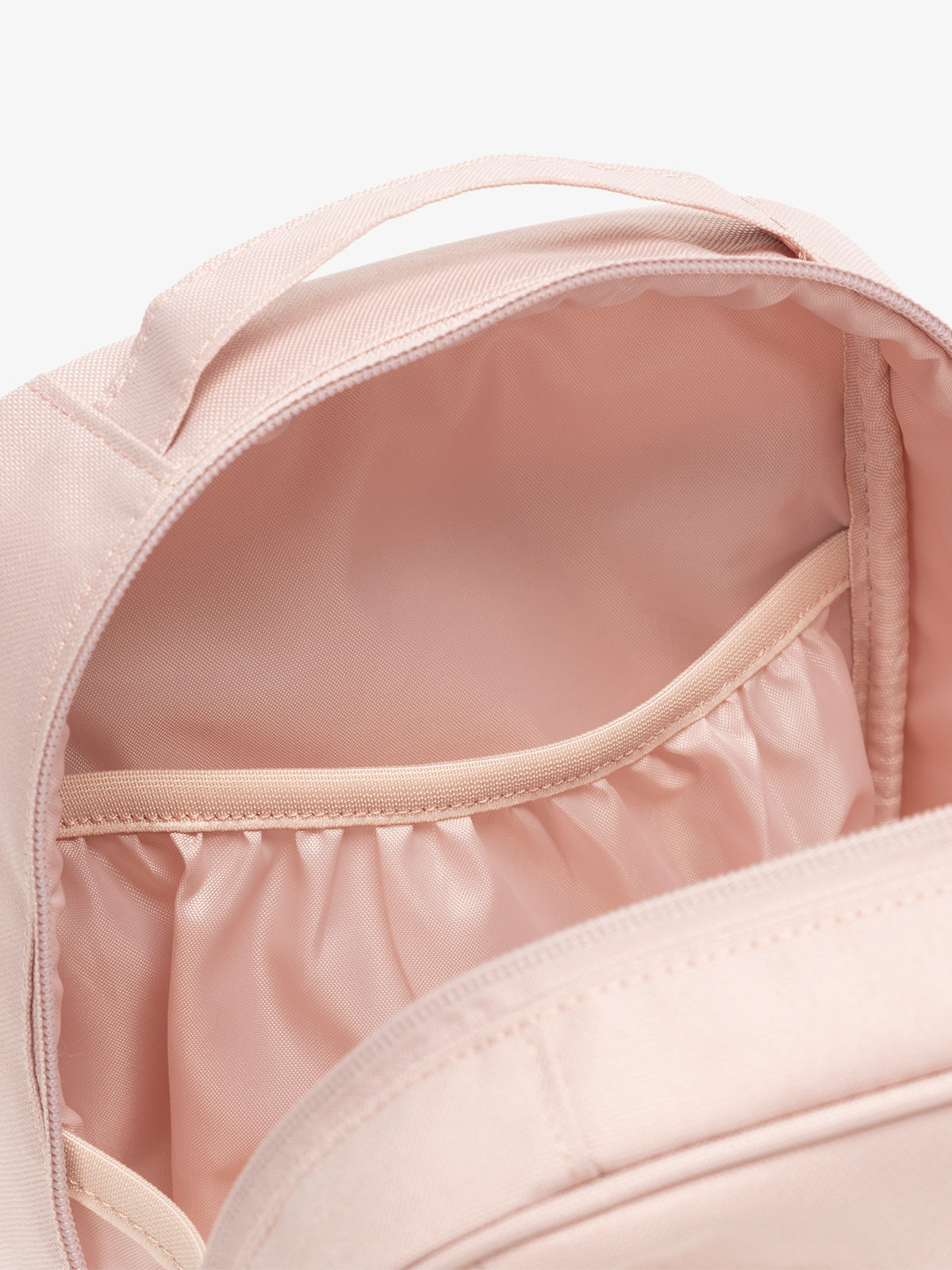 CALPAK The Everything Cube with multiple interior pockets and water resistant lining in pink sand; ACE2401-PINK-SAND