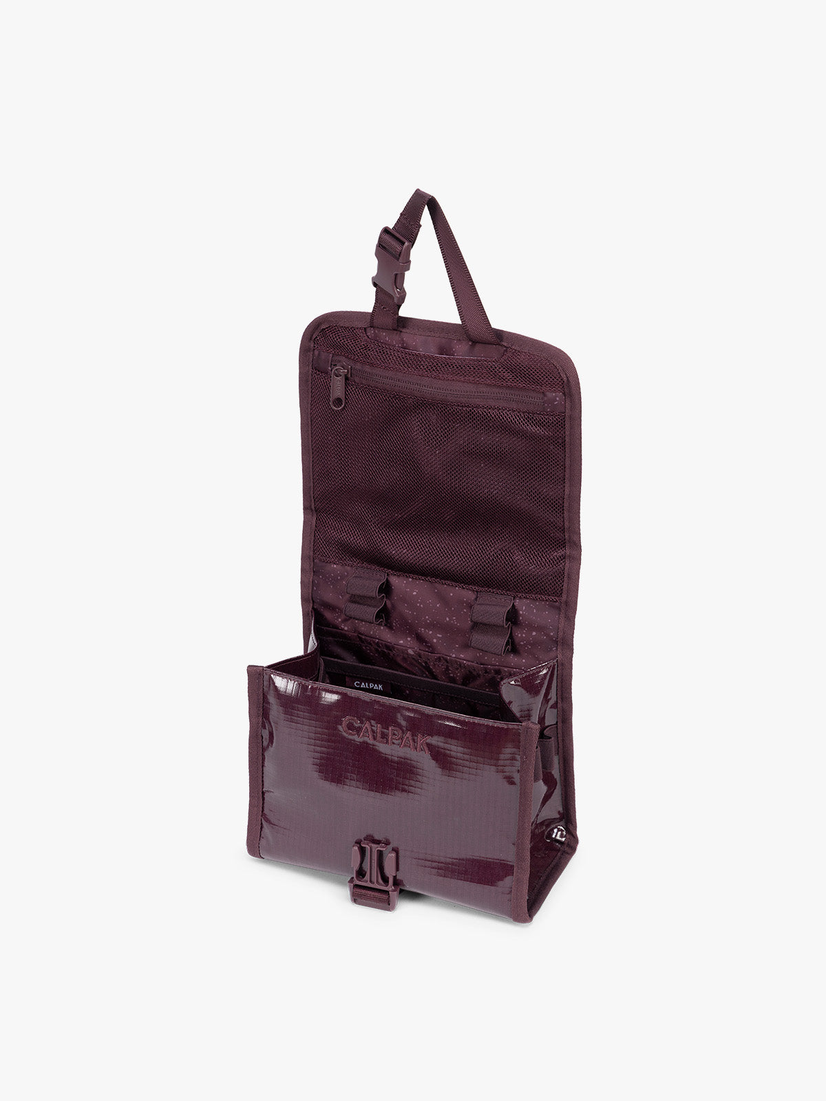 Opened CALPAK Terra Hanging Toiletry Bag to store makeup and toiletries in dark red  Dark Cherry on a white background; THY2201-DARK-CHERRY