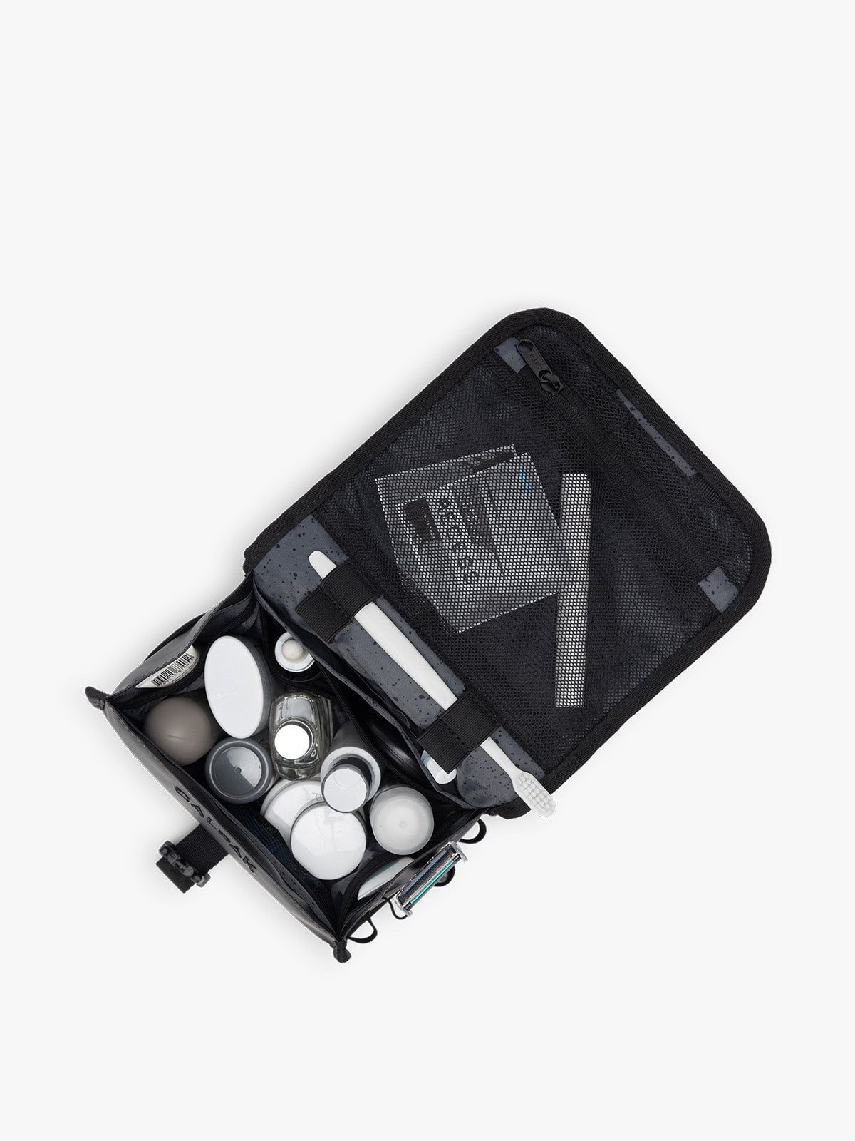 Items inside CALPAK Terra Hanging Toiletry Bag in black Matte Obsidian; THY2201-MATTE-OBSIDIAN