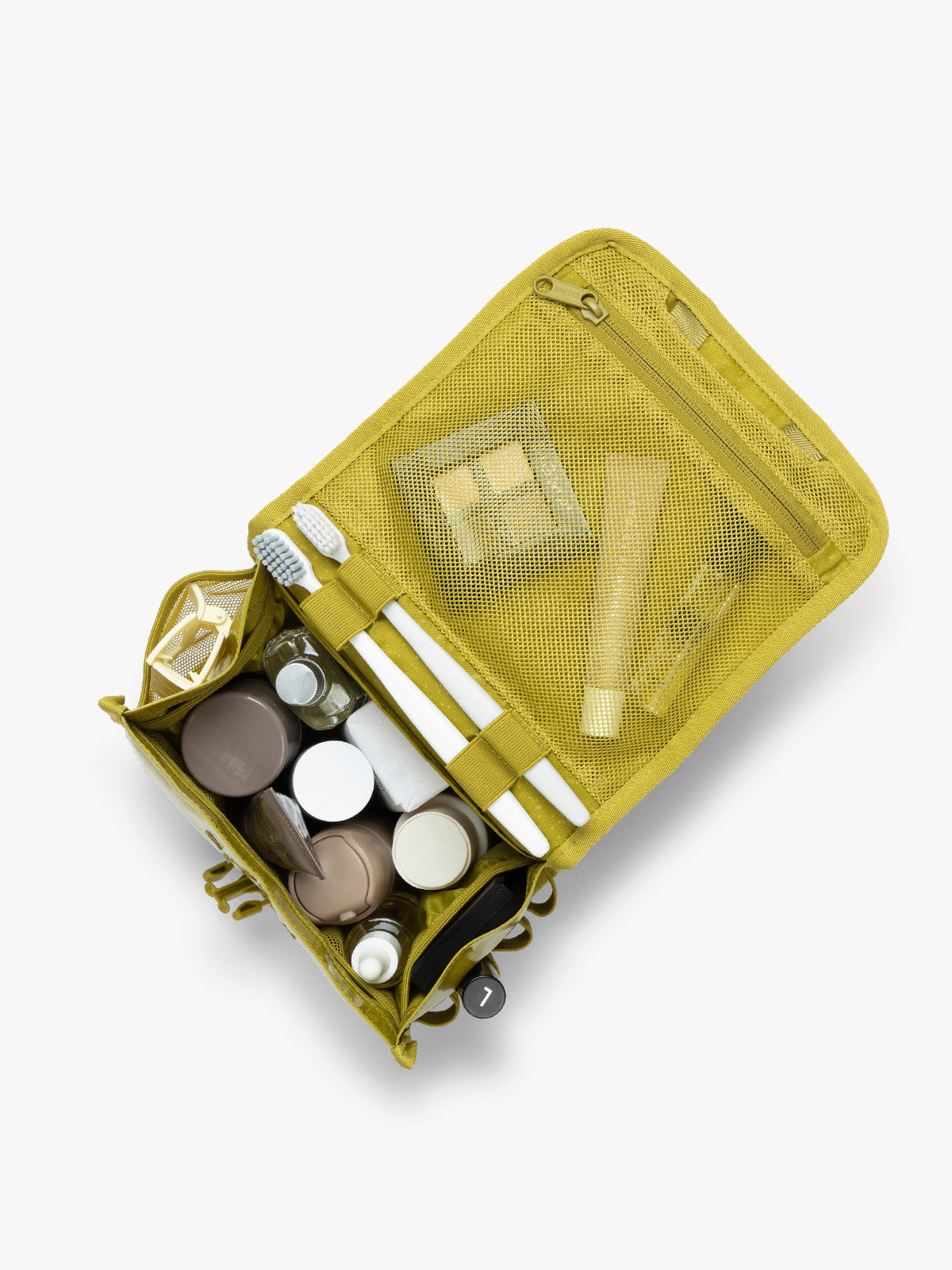 CALPAK Terra Hanging Toiletry Bag storing makeup and toiletries in yellow green Wasabi on a white background; THY2201-WASABI
