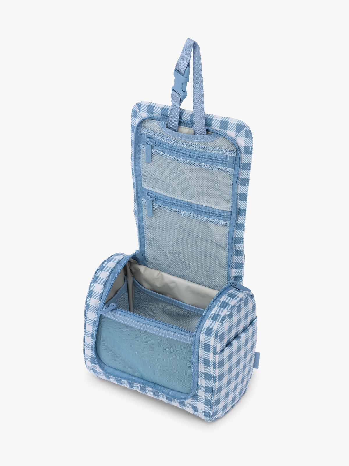 Opened view of CALPAK Luka Hanging Toiletry Bag in white and blue gingham print in French Blue Gingham; TLH2301-FRENCH-BLUE-GINGHAM