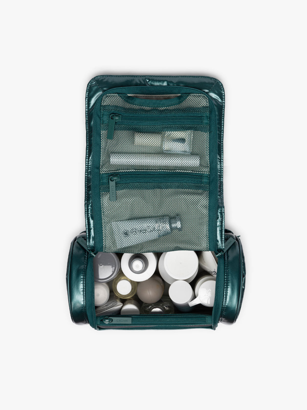 Toiletries in CALPAK Luka Hanging Toiletry Bag in dark green shiny Kale; TLH2301-GLAZED-KALE