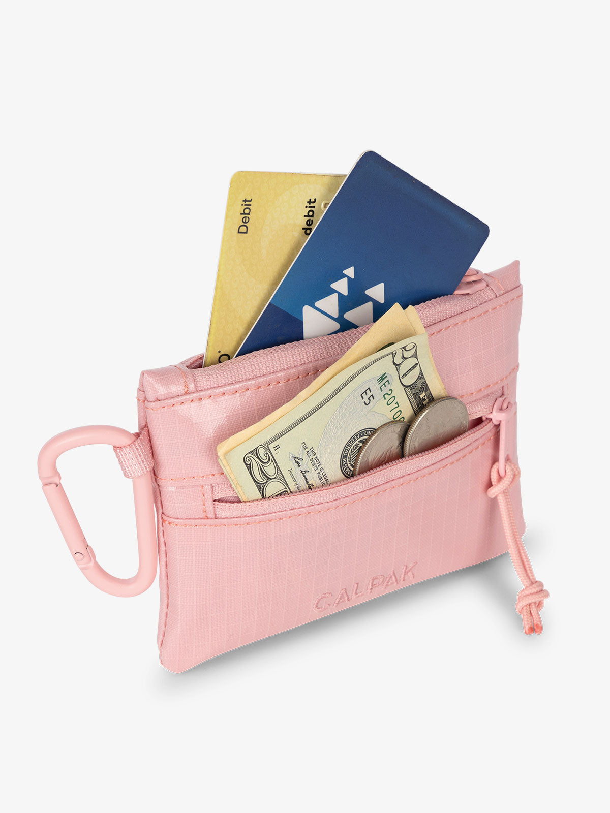CALPAK Terra Clippable Card Pouch in pink Blossom being used as cash and card wallet; TPC2401-BLOSSOM