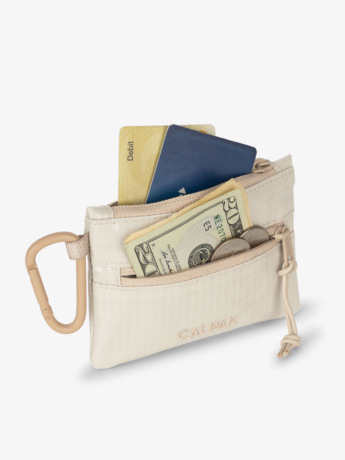 CALPAK Terra Clippable Card Pouch in off-white and tan White Sands being used as card and cash wallet; TPC2401-WHITE-SANDS