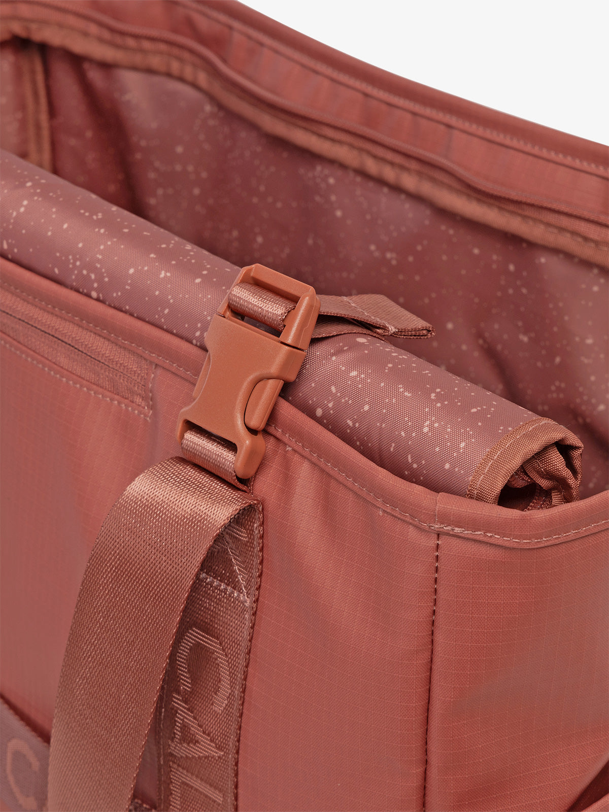 CALPAK Terra 35L Water Resistant Zippered Tote Bag in red and orange Matte Clay strap detail; TTO2401-CLAY