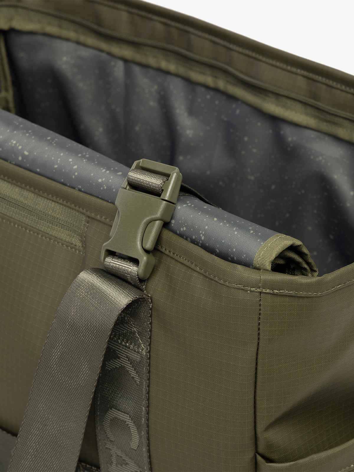 CALPAK Terra 35L Water Resistant Zippered Tote Bag in dark green Matte Pine strap detail; TTO2401-PINE