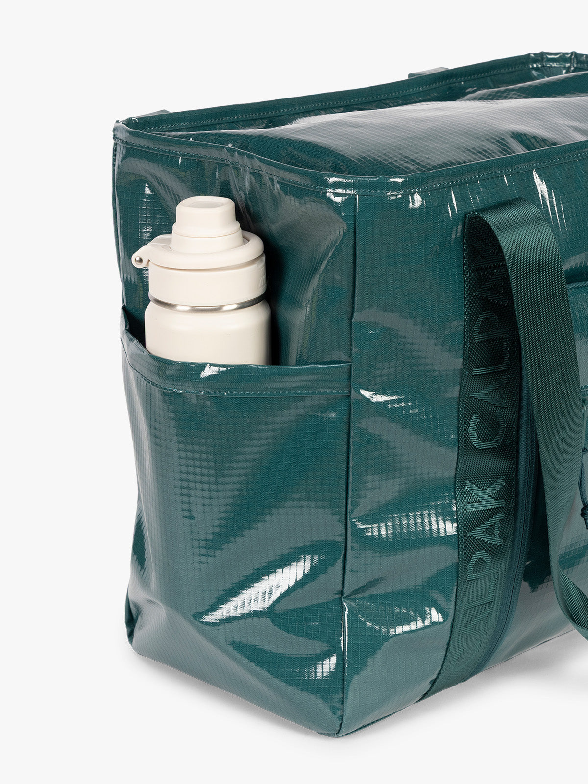 Side Water bottle holder of CALPAK Terra 35L Tote Bag with zippers in blue green Kale on a white background; TTO2401-KALE