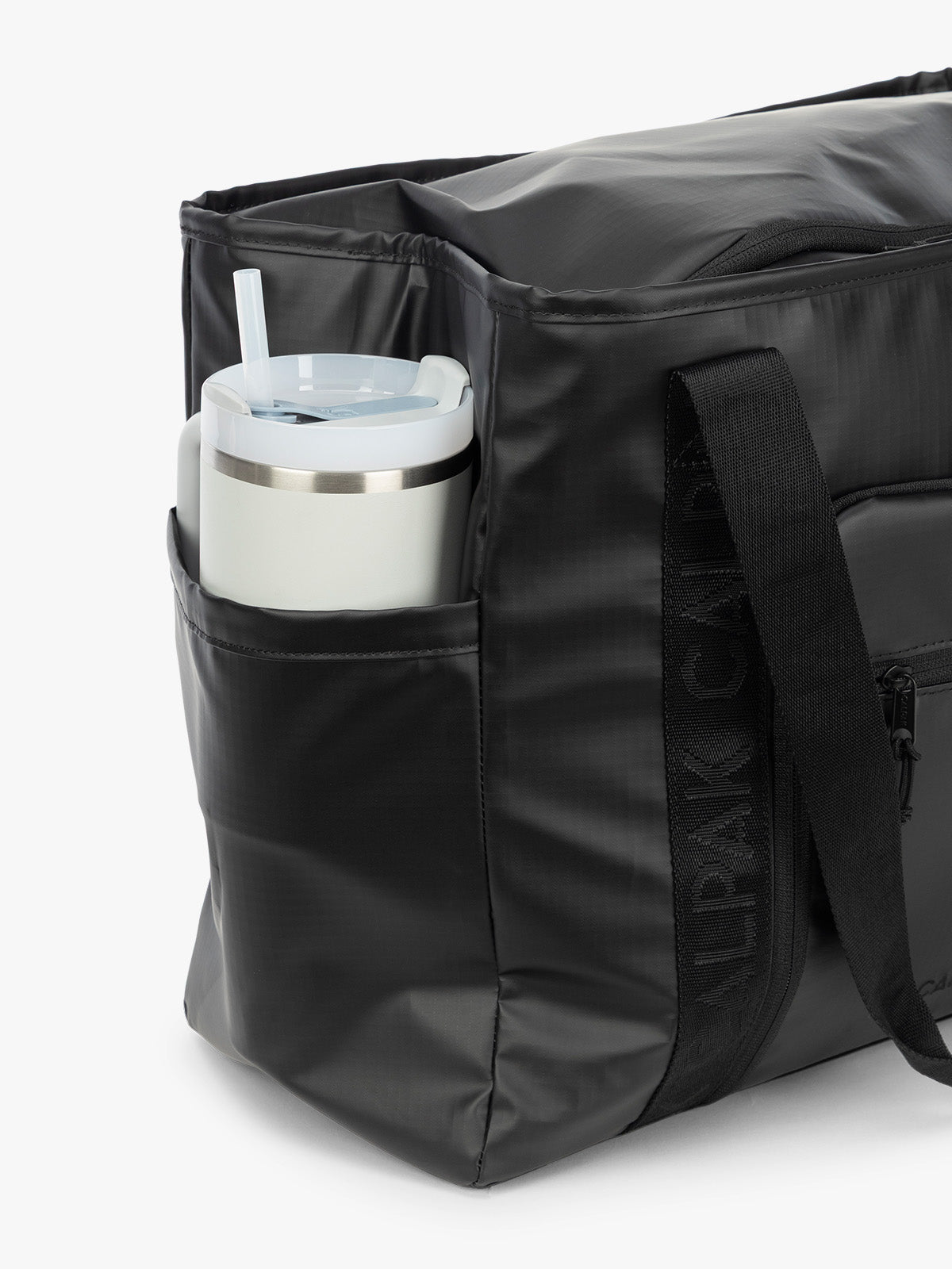 CALPAK Terra 35L Tote in black Matte Obsidian side pocket for water bottle; TTO2401-MATTE-OBSIDIAN