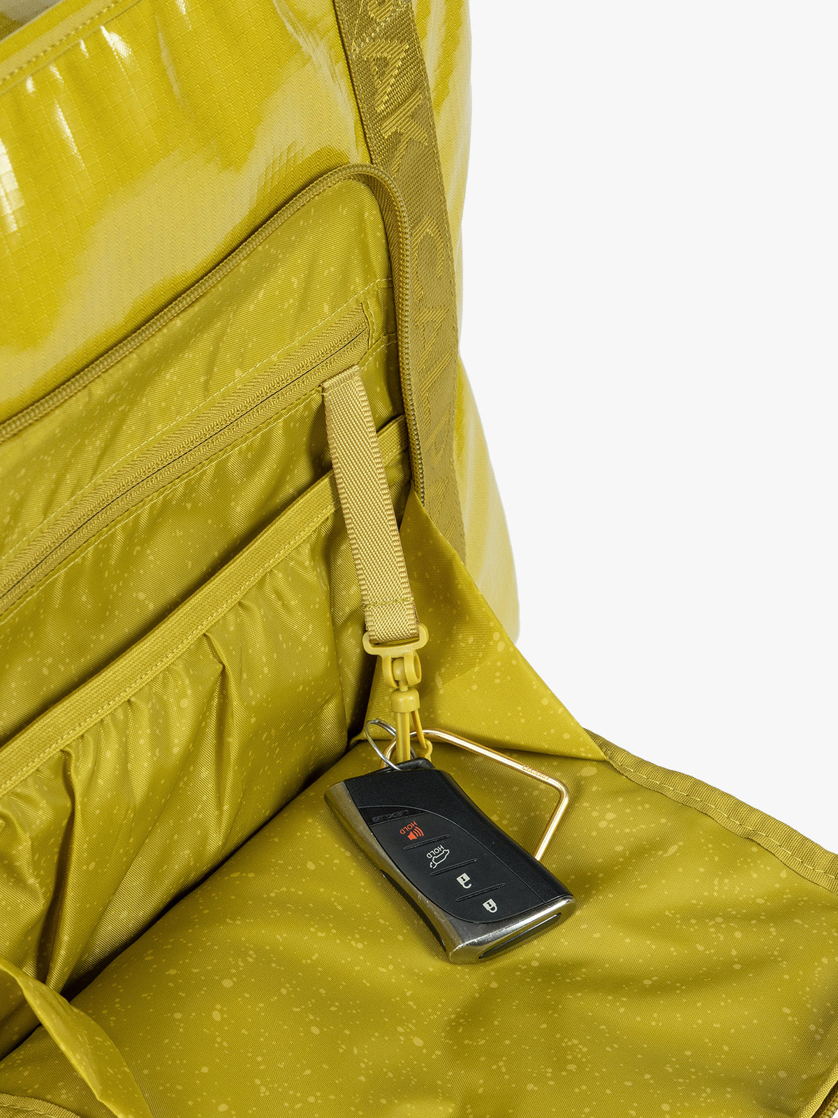 Key line of CALPAK Terra 35L Tote Bag with zippers in yellow green Wasabi on a white background; TTO2401-WASABI