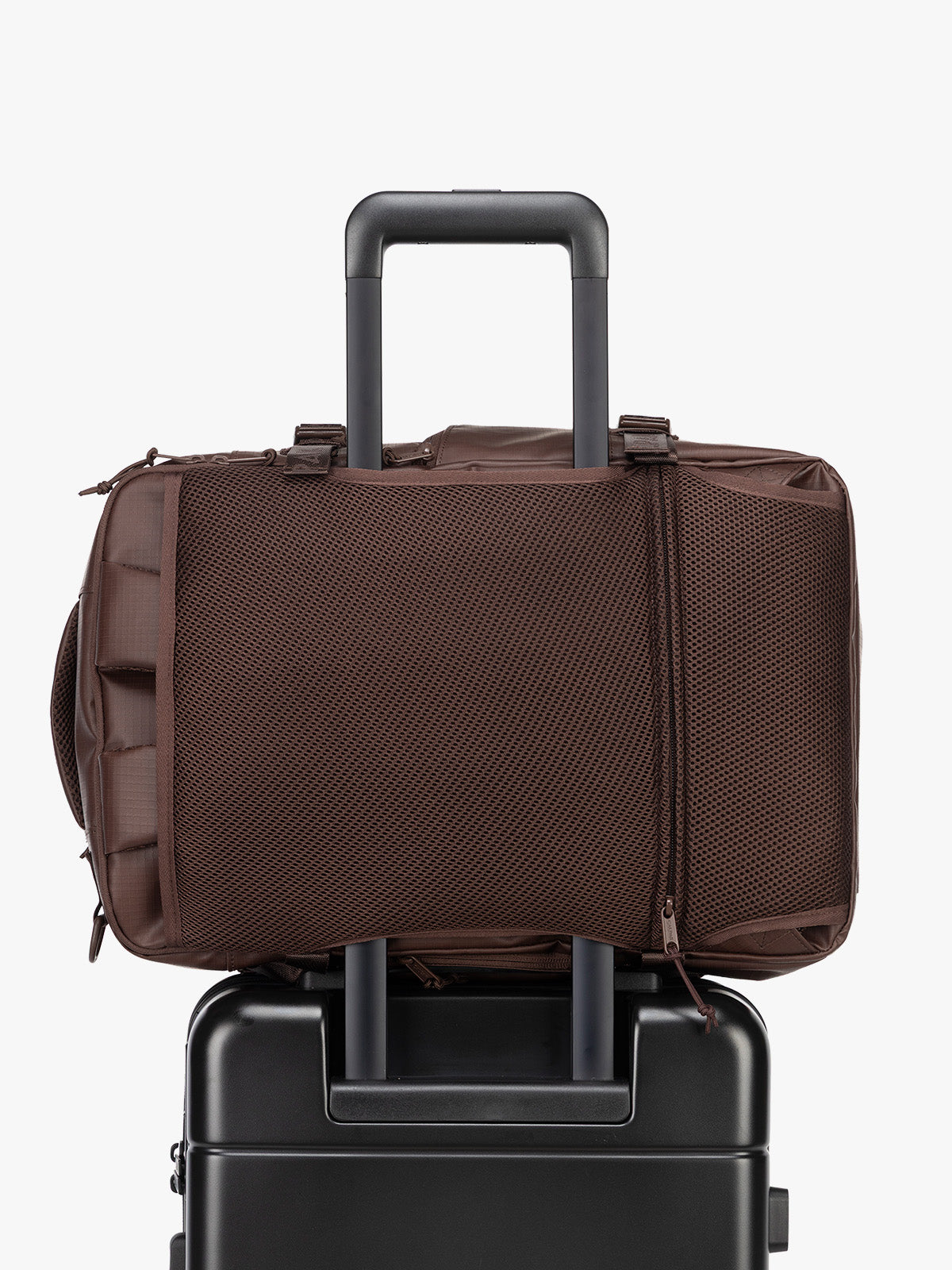 CALPAK Terra 26L Laptop Duffel Backpack in brown Walnut trolley sleeve view;  BPH2201-WALNUT