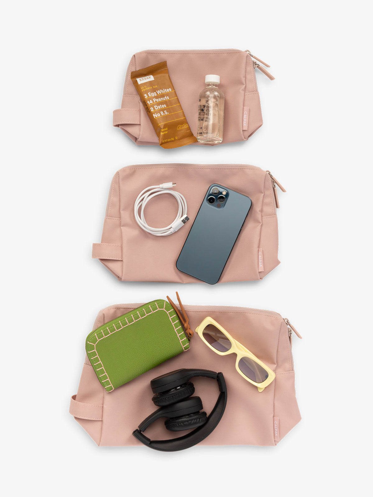 CALPAK waterproof zippered pouch set in size small, medium, and large in pink sand; PCZP2401-PINK-SAND