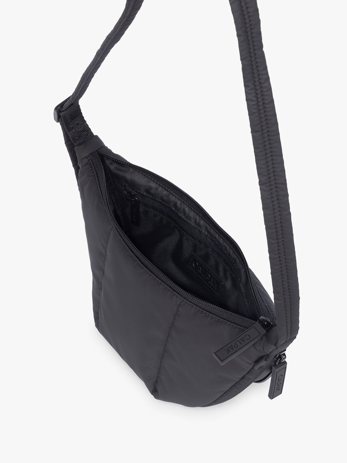 Opened CALPAK Luka Crescent Bag in Black; CBL2601-MATTE-BLACK