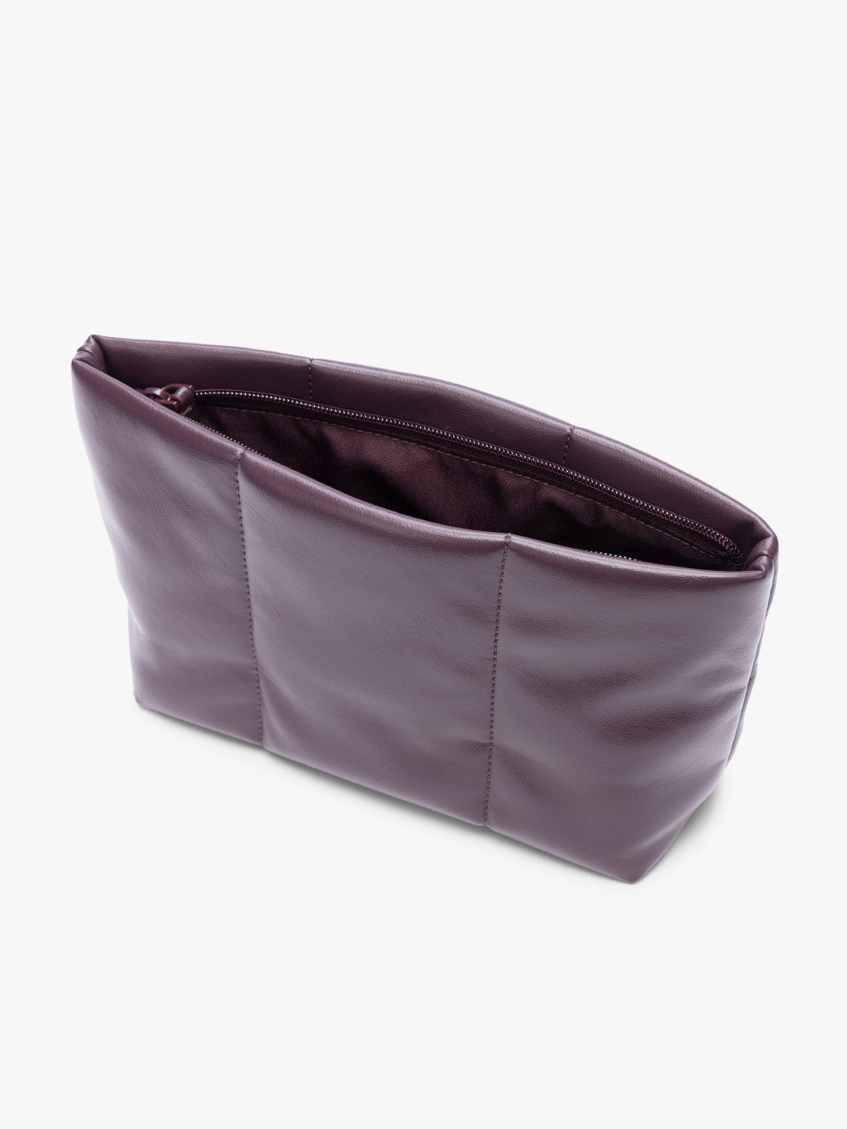 Opened zipper of CALPAK dark red Dark Cherry vegan leather pouch bag with a structured rectangular shape and vertical stitched panel details, shown against a plain white background; ZLPM2601-DARK-CHERRY-PU