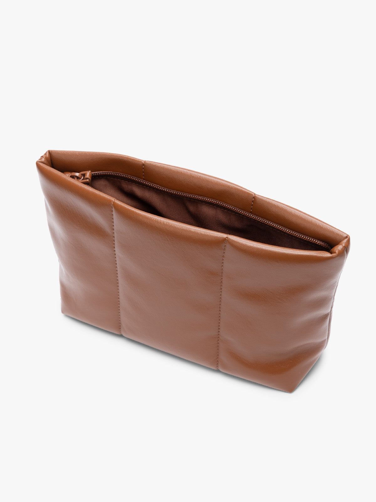 Opened zipper of CALPAK light brown Honey Brown vegan leather pouch bag with a structured rectangular shape and vertical stitched panel details, shown against a plain white background; ZLPM2601-HONEY-BROWN-PU