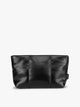 A CALPAK Luka 1 quart black vegan leather pouch bag with a quilted, padded design and a small black brand tag on the right side, shown against a plain white background; ZLPS2601-BLACK-PU