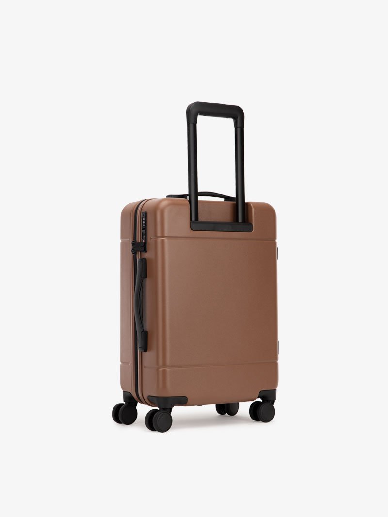 CALPAK Hue leightweight polycarbonate carry-on suitcase with laptop pocket in brown hazel color; LHU1020-HAZEL